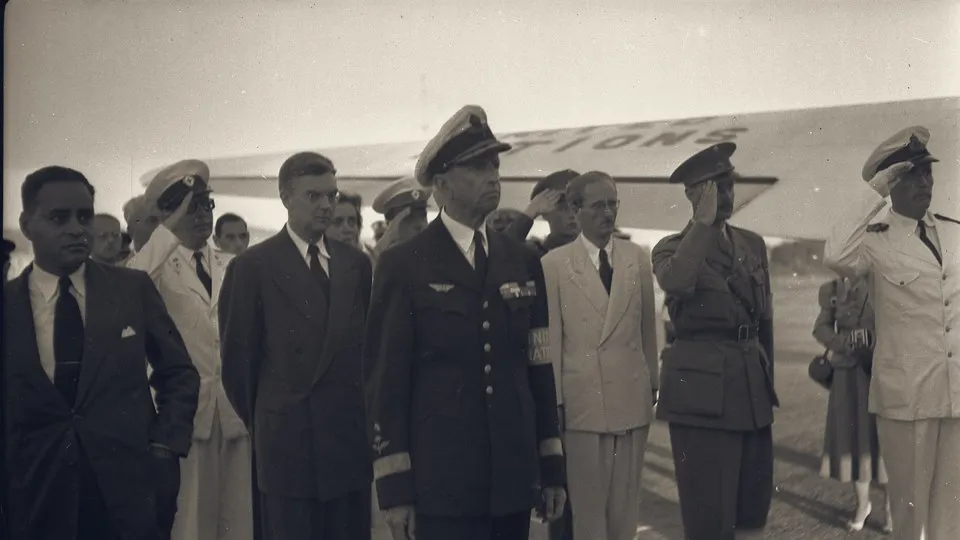 UN and Israeli officials salute at Lydda airport as Count Bernadotte's coffin leaves for Sweden, September 1948.