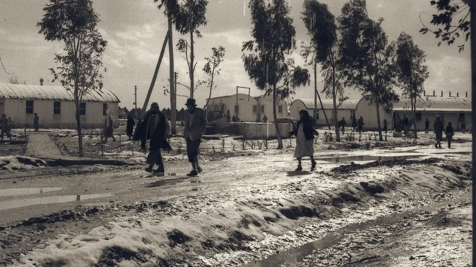 Snow and slush at the Ras al-Ein (Rosh HaAyin) immigrant camp, winter 1950.